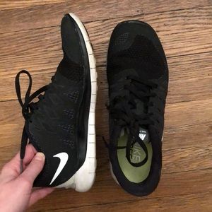 Women’s black Nike free 5.0, size 8.5